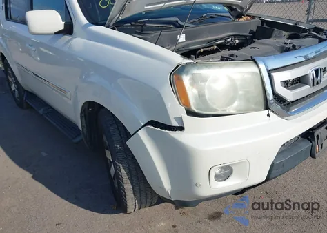 2011 Honda Pilot Touring z USA, uszkodzony, nr VIN 5FNYF4H97BB065766